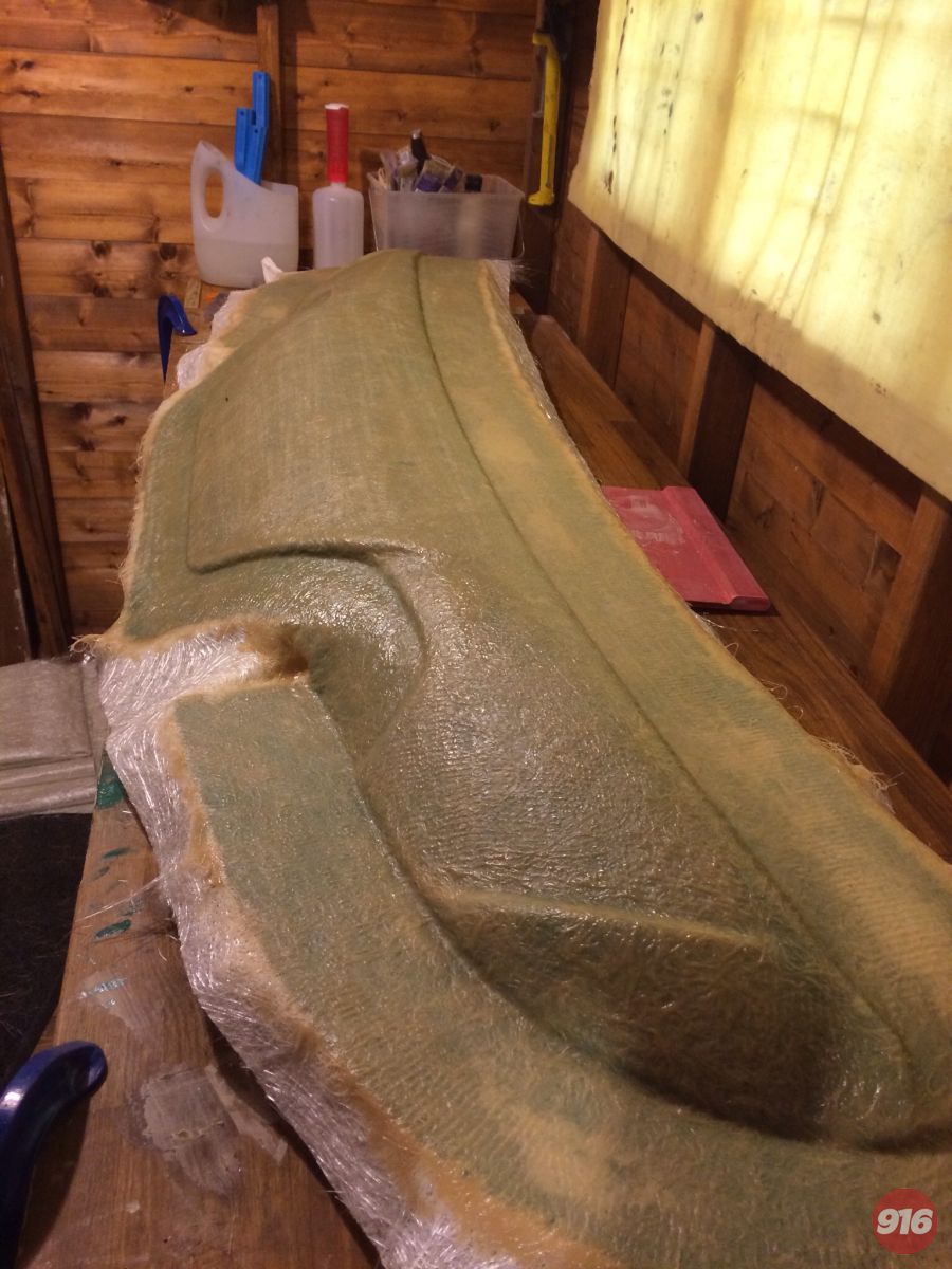 After the gel tacks one layer of tissue then first layer of glass fibre goes on I have used an expensive non sharing tooling resin for this